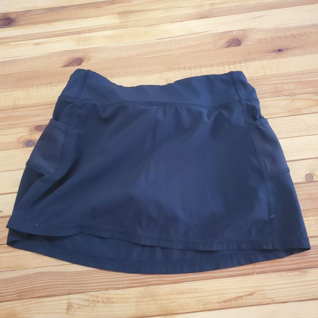 	
athleta girl pleated skirt